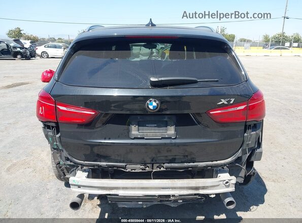 WBXHT3C32H5F68031 2017 BMW X1 Black Vista frontal