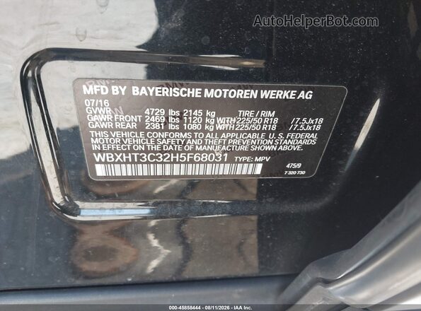 WBXHT3C32H5F68031 2017 BMW X1 Black Vista del compartimento del motor