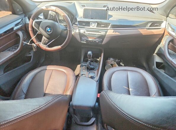 WBXHT3C32H5F70751 2017 BMW X1 Brown Dashboard view