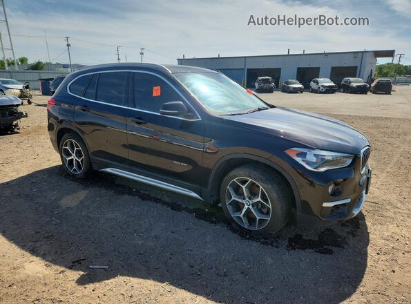 WBXHT3C32H5F70751 2017 BMW X1 Brown Front right