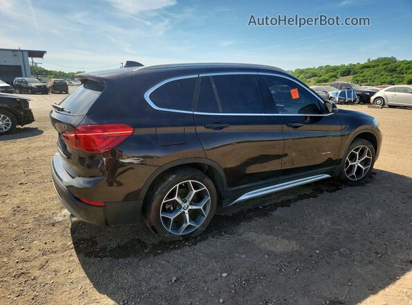 WBXHT3C32H5F70751 2017 BMW X1 Brown Rear right