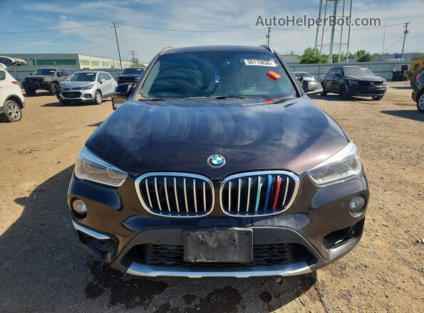 WBXHT3C32H5F70751 2017 BMW X1 Brown Front view