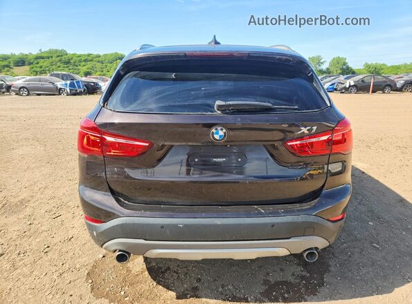 WBXHT3C32H5F70751 2017 BMW X1 Brown Rear view