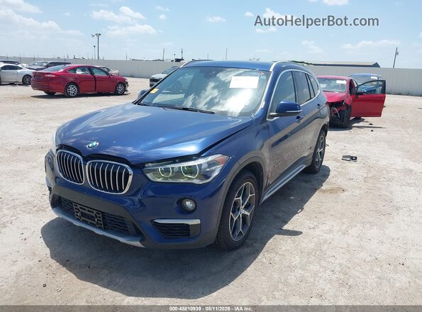 WBXHT3C32H5F77912 2017 BMW X1 Dark Blue Передня ліва чверть