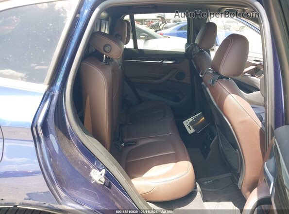 WBXHT3C32H5F77912 2017 BMW X1 Dark Blue Вид наклейки з VIN-кодом
