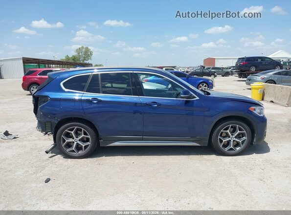 WBXHT3C32H5F77912 2017 BMW X1 Dark Blue Панорамний вид салону 360°