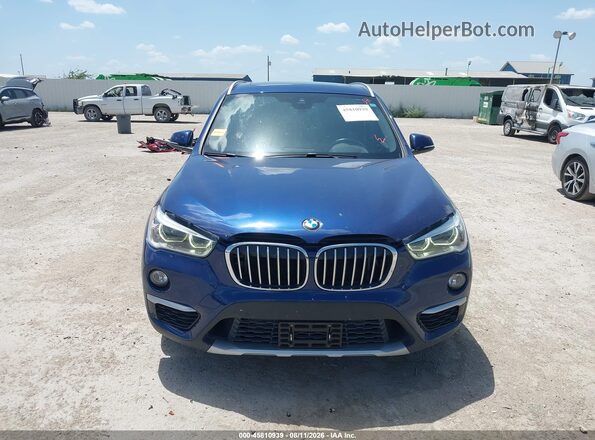 WBXHT3C32H5F77912 2017 BMW X1 Dark Blue Вид задньої частини салону