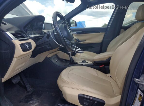 WBXHT3C33H5F69771 2017 BMW X1 Blue წინა სალონის ხედი