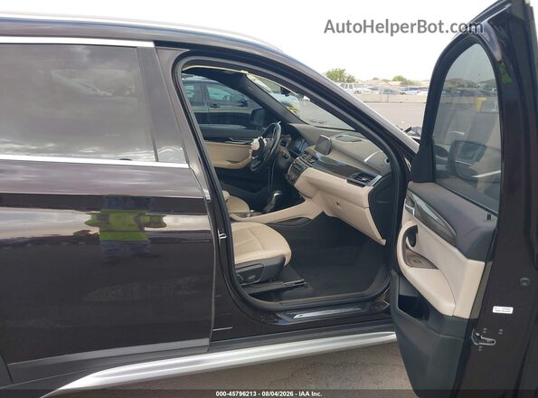 WBXHT3C33J3H33165 2018 BMW X1 Brown Widok wnętrza z przodu