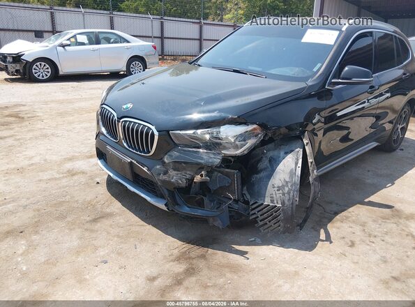 WBXHT3C33J5K23254 2018 BMW X1 Black Front view