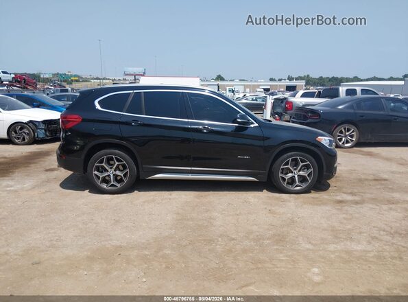 WBXHT3C33J5K23254 2018 BMW X1 Black 360 interior view