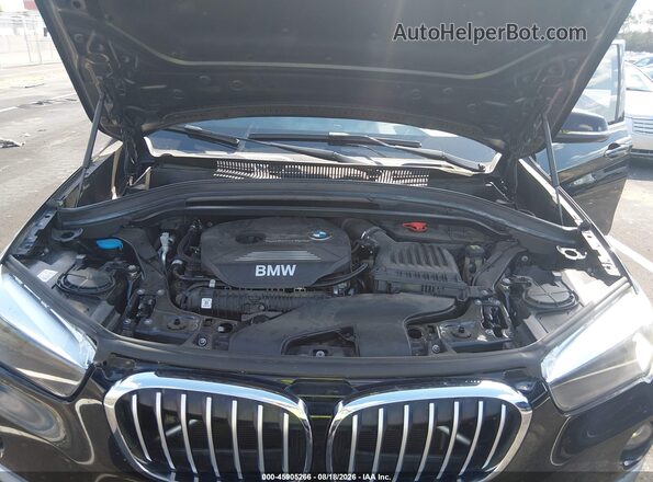WBXHT3C33J5L26125 2018 BMW X1 Black Вид ззаду