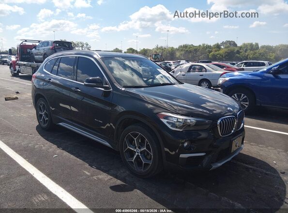 WBXHT3C33J5L26125 2018 BMW X1 Black Вид задньої частини салону