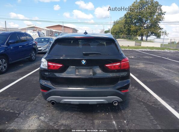 WBXHT3C33J5L26125 2018 BMW X1 Black 
