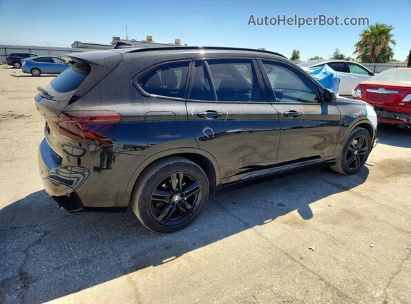 WBXHT3C33J5L28814 2018 BMW X1 Black Trasero derecho