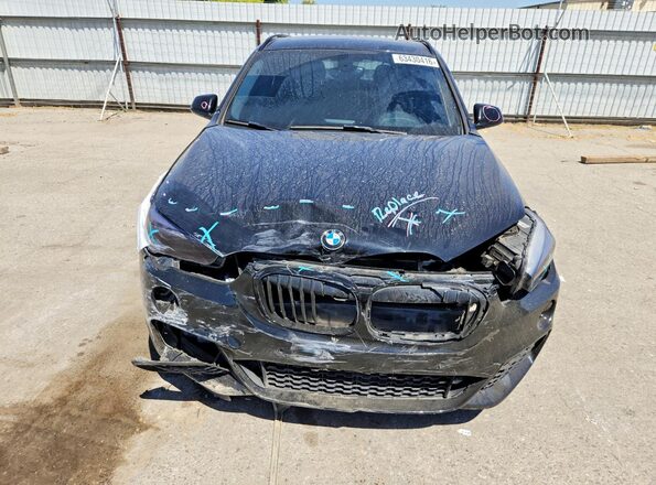 WBXHT3C33J5L28814 2018 BMW X1 Black Vista frontal
