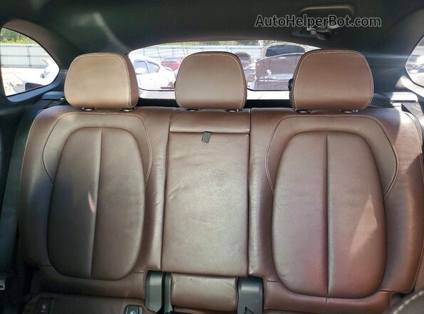 WBXHT3C34H5F85087 2017 BMW X1 White Հետևի նստատեղերի տեսք