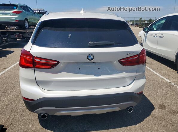 WBXHT3C34H5F85087 2017 BMW X1 White Հետևի տեսք