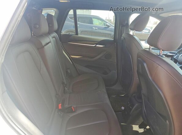 WBXHT3C34J5F91283 2018 BMW X1 White Rear seats view