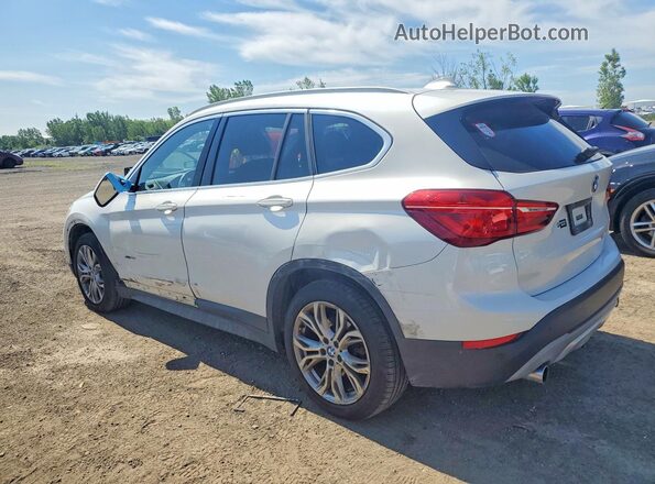 WBXHT3C34J5F91283 2018 BMW X1 White Rear left