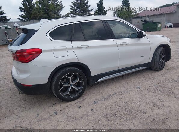 WBXHT3C35G5E48089 2016 BMW X1 White Rear right