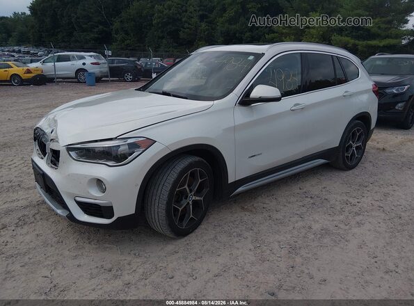WBXHT3C35G5E48089 2016 BMW X1 White Front left