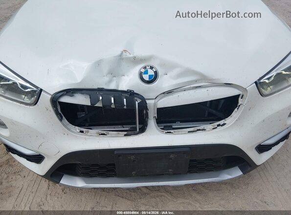 WBXHT3C35G5E48089 2016 BMW X1 White Front view