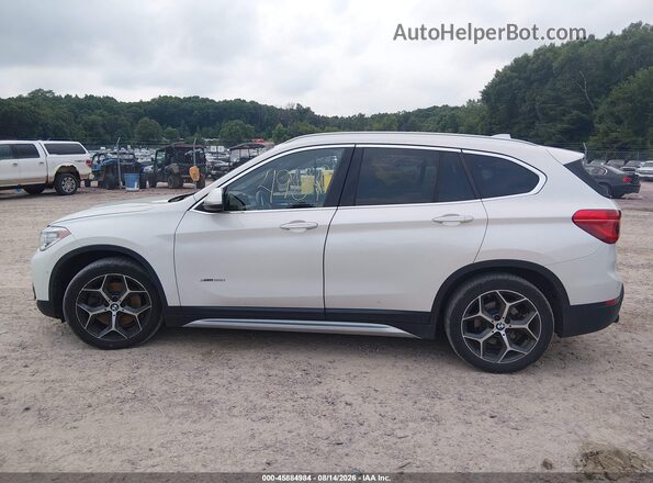 WBXHT3C35G5E48089 2016 BMW X1 White 360 interior view