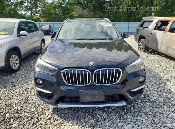 WBXHT3C35GP886418 2016 BMW X1 Black Դիմացի տեսք