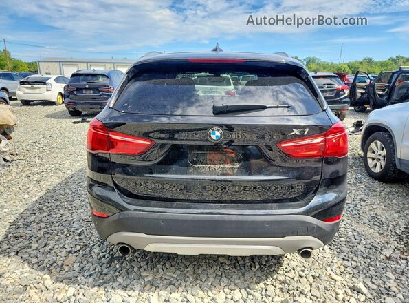 WBXHT3C35GP886418 2016 BMW X1 Black Հետևի տեսք