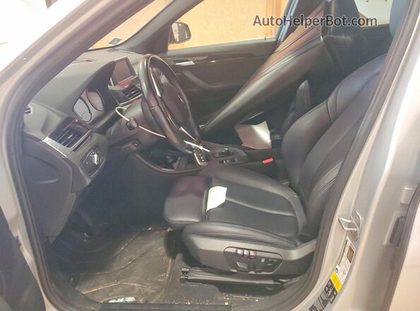 WBXHT3C35J5L28104 2018 BMW X1 Silver Front interior view