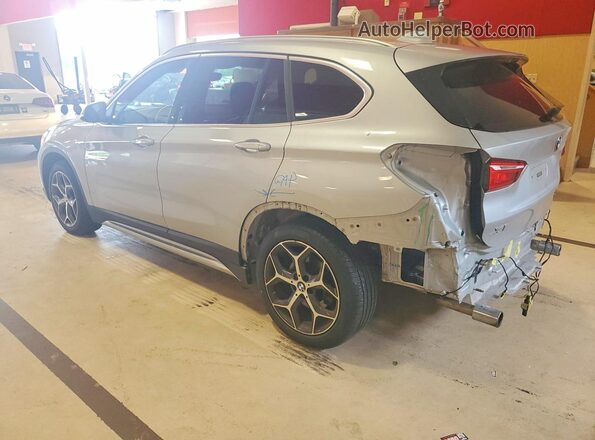 WBXHT3C35J5L28104 2018 BMW X1 Silver Rear left