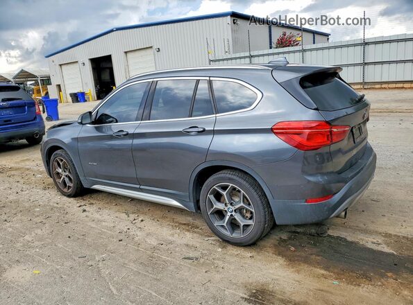 WBXHT3C36G5E48134 2016 BMW X1 Gray Rear left