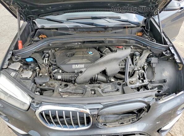 WBXHT3C36G5E48134 2016 BMW X1 Gray Engine compartment view