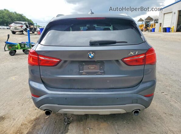 WBXHT3C36G5E48134 2016 BMW X1 Gray Rear view
