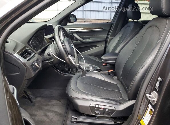 WBXHT3C36G5E48134 2016 BMW X1 Gray Front interior view
