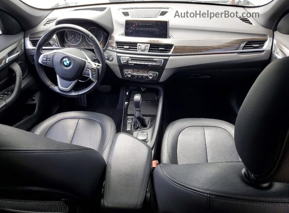 WBXHT3C36G5E48134 2016 BMW X1 Gray Dashboard view
