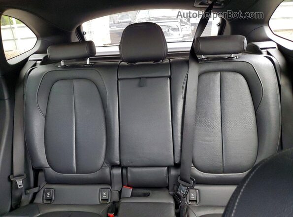 WBXHT3C36G5E48134 2016 BMW X1 Gray Rear seats view