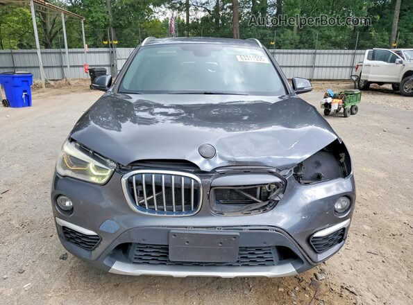 WBXHT3C36G5E48134 2016 BMW X1 Gray Front view