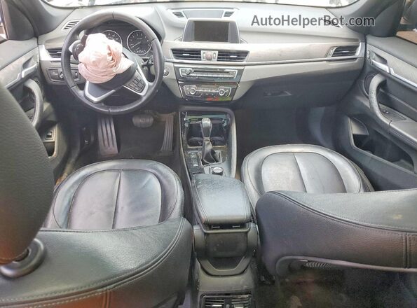 WBXHT3C36G5F66183 2016 BMW X1 Black Vista del salpicadero