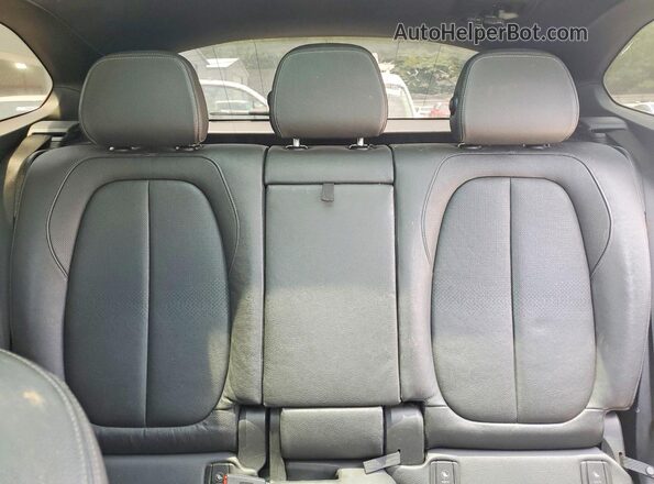 WBXHT3C36G5F66183 2016 BMW X1 Black Vista de los asientos traseros