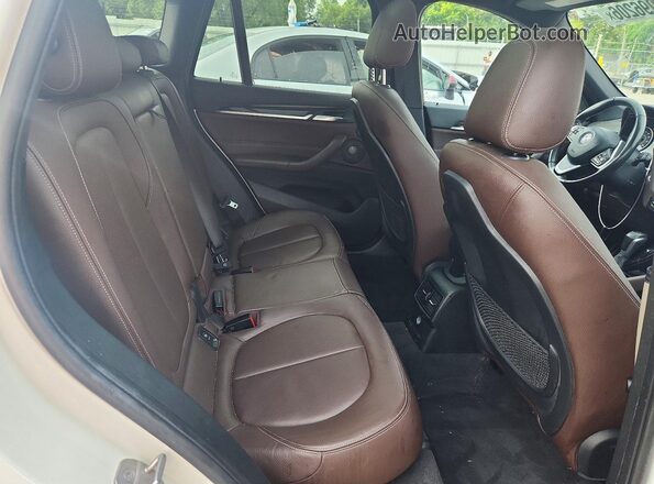 WBXHT3C36GP881907 2016 BMW X1 White Rear interior view
