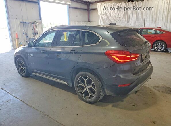 WBXHT3C36H5F68386 2017 BMW X1 Gray Trasero izquierdo