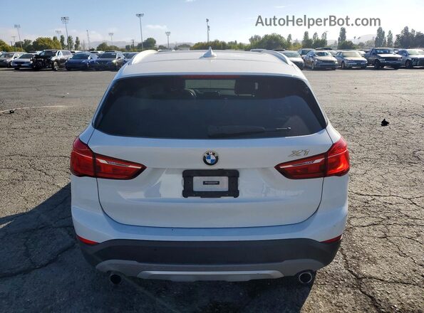 WBXHT3C36H5F74852 2017 BMW X1 White Հետևի տեսք