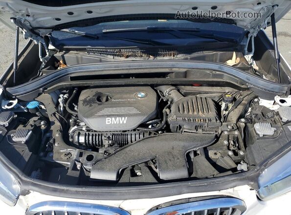WBXHT3C36H5F74852 2017 BMW X1 White Սալոնի հետևի տեսք
