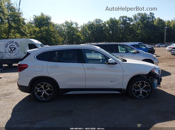 WBXHT3C36H5F87214 2017 BMW X1 White უკანა სალონის ხედი