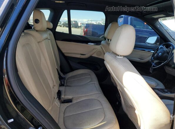 WBXHT3C36J5K20462 2018 BMW X1 Black Вид задньої частини салону