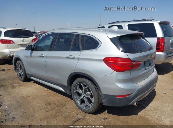 WBXHT3C36J5K24382 2018 BMW X1 Silver Rear left