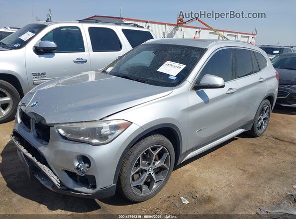 WBXHT3C36J5K24382 2018 BMW X1 Silver Front left
