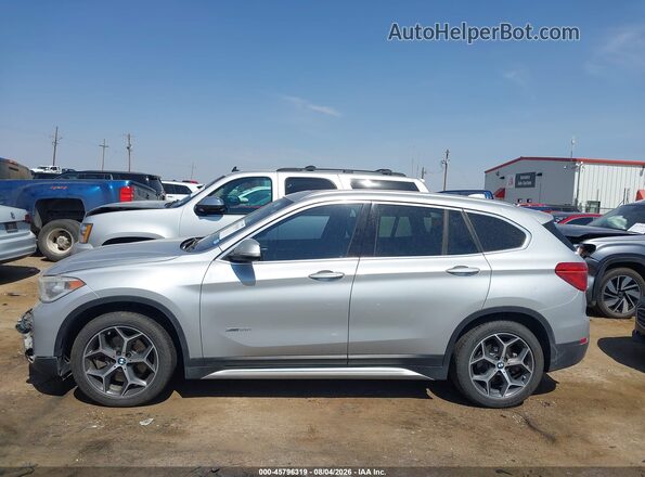 WBXHT3C36J5K24382 2018 BMW X1 Silver Rear interior view